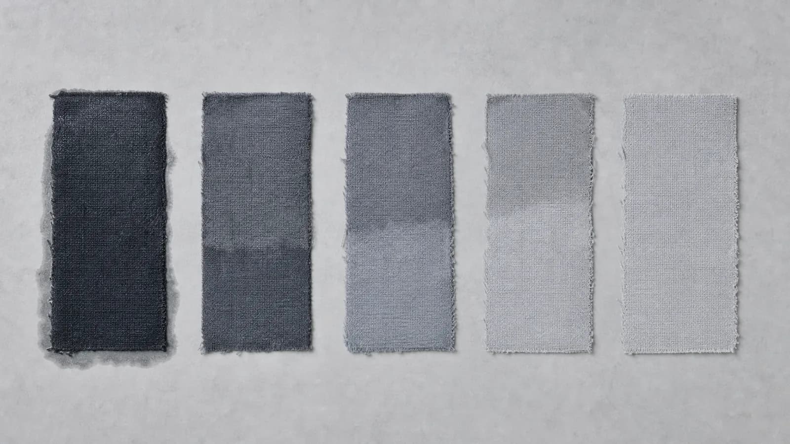Five fabric swatches of the same material photographed side by side, from fully saturated on the left to fully dry on the right