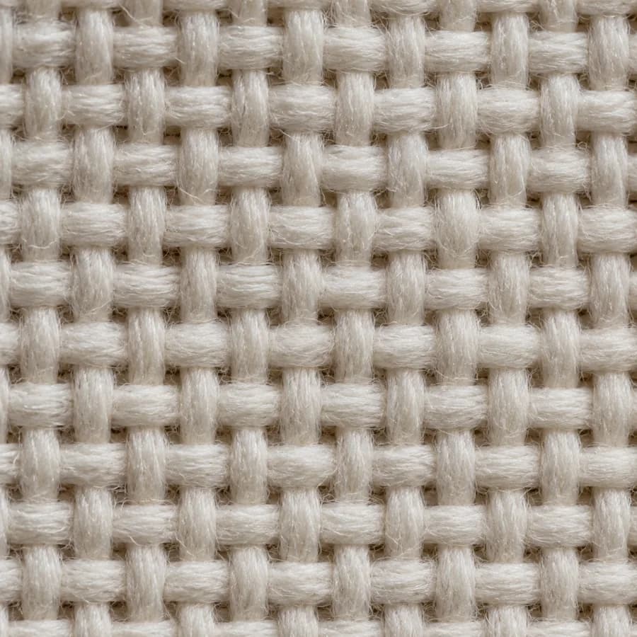 Macro view of cotton poplin showing its tight plain weave, staple cotton, high absorbency